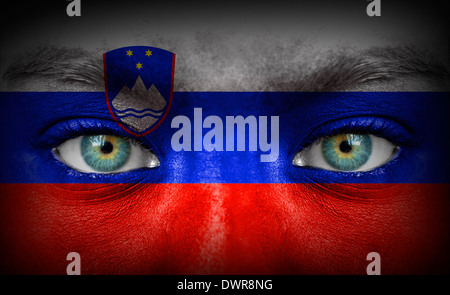 Human face painted with flag of Slovenia Stock Photo - Alamy