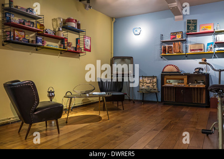 Living room interior showing home furniture of the fifities at the House of Alijn museum, Ghent, Belgium Stock Photo