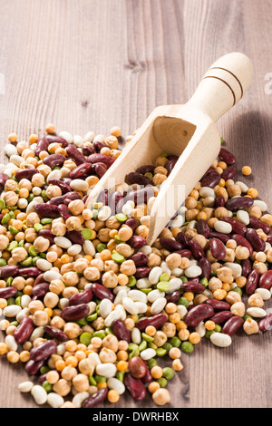 Mix of white and red string bean, lentil, green and yellow peas Stock Photo