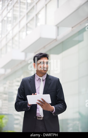 indian business male with a tablet Stock Photo