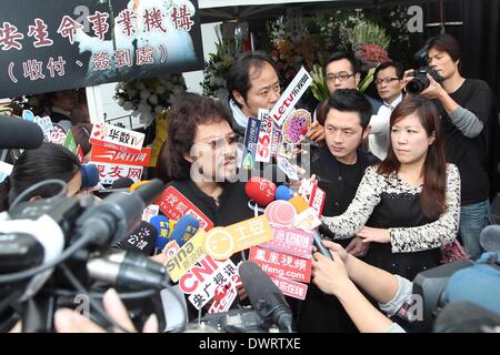 Funeral of the late singer Gao Lingfeng held in Taipei on Wednesday March 12, 2014.Gao Lingfeng`s son Baodi, ex-wife Jin Youzhuang, friend Zhang Fei, Wang Weizhong, Makiyo and Shino Lin present the funeral. Stock Photo