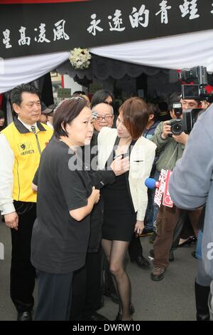 Funeral of the late singer Gao Lingfeng held in Taipei on Wednesday March 12, 2014.Gao Lingfeng`s son Baodi, ex-wife Jin Youzhuang, friend Zhang Fei, Wang Weizhong, Makiyo and Shino Lin present the funeral. Stock Photo