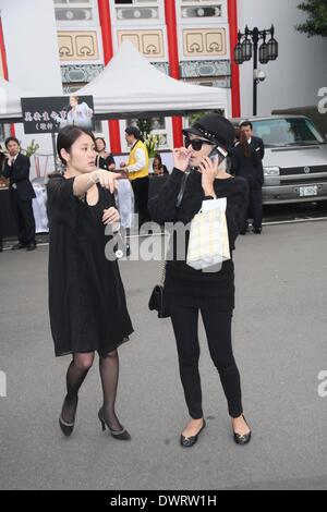 Funeral of the late singer Gao Lingfeng held in Taipei on Wednesday March 12, 2014.Gao Lingfeng`s son Baodi, ex-wife Jin Youzhuang, friend Zhang Fei, Wang Weizhong, Makiyo and Shino Lin present the funeral. Stock Photo