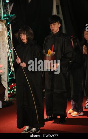 Funeral of the late singer Gao Lingfeng held in Taipei on Wednesday March 12, 2014.Gao Lingfeng`s son Baodi, ex-wife Jin Youzhuang, friend Zhang Fei, Wang Weizhong, Makiyo and Shino Lin present the funeral. Stock Photo