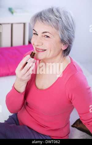 Herbal medicine, elderly person Stock Photo