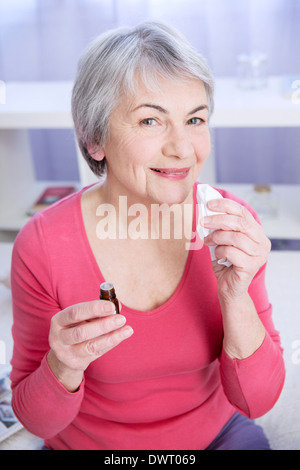 Herbal medicine, elderly person Stock Photo