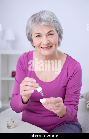 Herbal medicine, elderly person Stock Photo