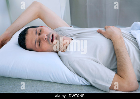 Snoring man Stock Photo