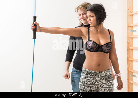 Woman in physical therapy Stock Photo