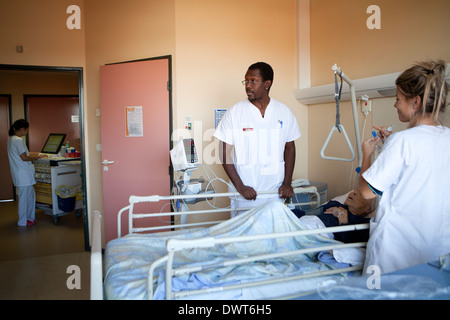Nurses with patient Stock Photo