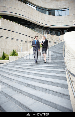 two business people walking the stairs Stock Photo - Alamy