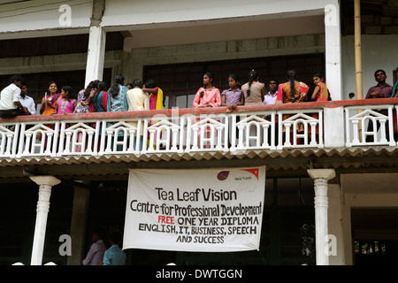 Students on school balcony during interval at the Tea Leaf Vision school in Maskeliya, Sri Lanka Stock Photo