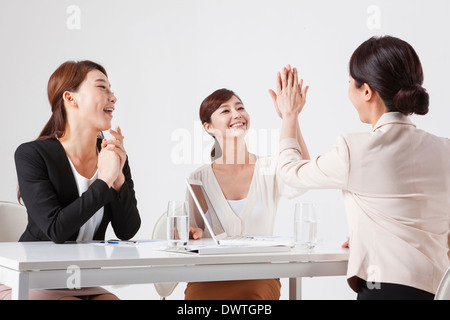 a group of women working Stock Photo