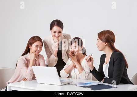 a group of women working Stock Photo