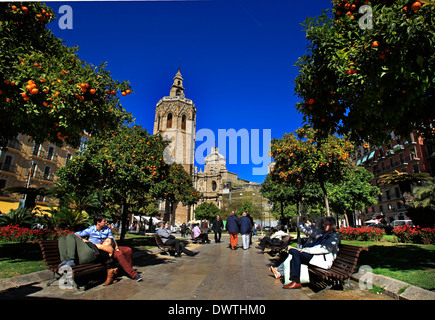 A general view of people relaxing and going about their day in the Plaza de la Reina, Valencia, Spain Stock Photo