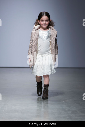 Girl walks runway for Imoga by Heajung Chung at Vogue Bambini petiteParade Kids Fashion Week in New York Stock Photo