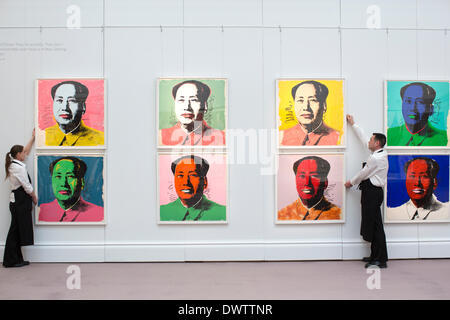 Sotheby's, New Bond Street, London, UK 13th March, 2014. Sotheby's auction of Prints & Multiples, Old Master, Modern and Contemporary, London, UK Curators organise Andy Warhol canvases of the Chinese communist leader Mao Zedong. Credit:  Jeff Gilbert/Alamy Live News Stock Photo