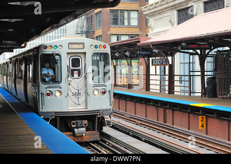 USA Illinois Chicago CTA Brown Line rapid transit train pulls into Quincy Street Station. Stock Photo