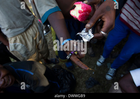 A man who lives in the Albert Park shows evidence of smoking heroine and other narcotics, Durban 11 February 2014. © Rogan Ward Stock Photo