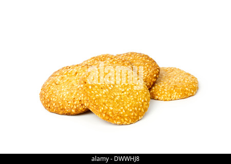 Couple of sesame cookies against white background Stock Photo