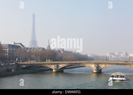 PARIS, FRANCE - MARCH 5, 2011:View on the Pont Neuf and the Eiffel tower in Paris, France. Stock Photo