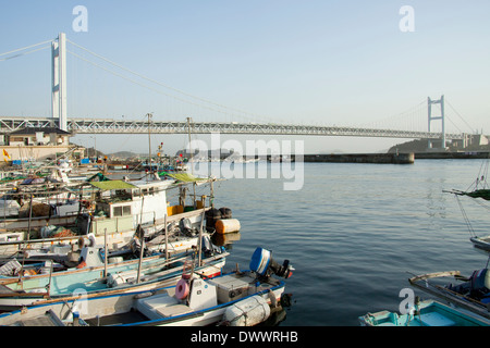 Seto Ohashi Bridge and fishing boats, Japan Stock Photo