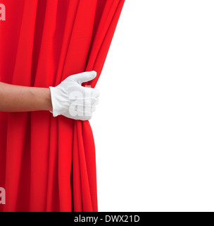 hand opening red curtain on white. Stock Photo