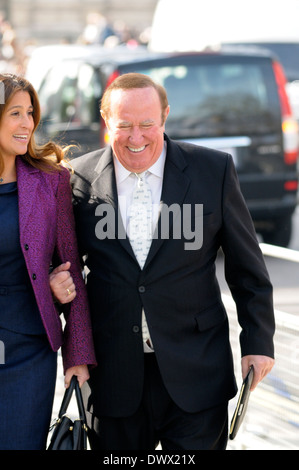 Andrew Neil, Scottish journalist and broadcaster, with partner Susan Nilsson [at memorial Service for David Frost, London, 2014] Stock Photo