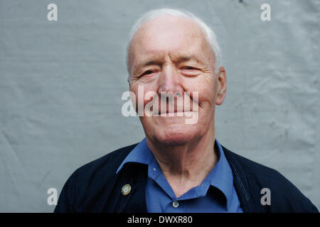 FILE PIX OF TONY BENN. Manchester, UK.  2006. Tony Benn smokes his iconic pipe in Manchester.  He had attended the Time to Go demonstration opposing the war in Iraq. Former politician and President of the Stop the War Coalition Tony Benn died March 13 2014 at 88. Credit:  Kristian Buus/Alamy Live News Stock Photo