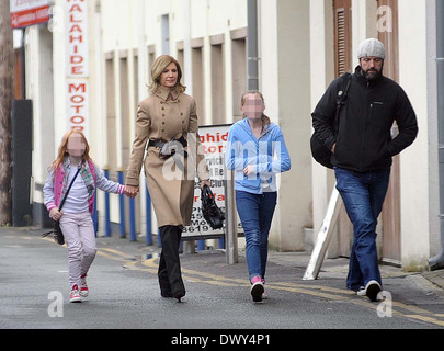 Yvonne Keating and boyfriend John Conroy take her two daughters, Missy and Ali for a meal at an Indian restaurant in Malahide village Dublin, Ireland - 14.10.12 Featuring: Yvonne Keating and boyfriend John Conroy Where: Ireland When: 14 Oct 2012 **or publ Stock Photo