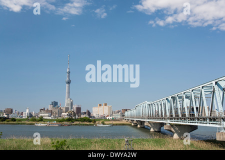 Railway bridge over Arakawa River, Tokyo, Japan Stock Photo