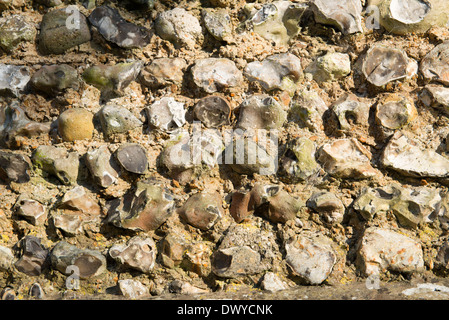Detail close up of a flint wall, part of a traditional Sussex flint cottage Stock Photo