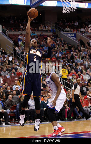 Philadelphia, Pennsylvania, USA . 14th Mar, 2014. March 14, 2014: Indiana Pacers forward Lavoy Allen (5) shoots the ball with Philadelphia 76ers forward Thaddeus Young (21) watching during the NBA game between the Indiana Pacers and the Philadelphia 76ers at the Wells Fargo Center in Philadelphia, Pennsylvania. The Kings won 115-98. Christopher Szagola/Cal Sport Media Credit:  Cal Sport Media/Alamy Live News Stock Photo