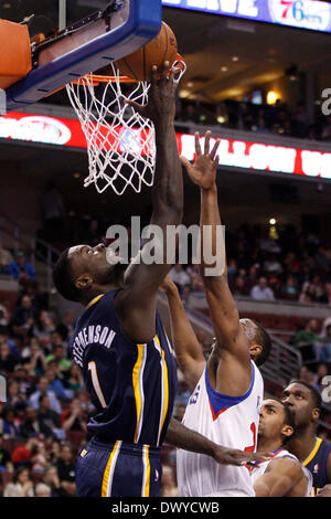 Philadelphia, Pennsylvania, USA . 14th Mar, 2014. March 14, 2014: Indiana Pacers guard Lance Stephenson (1) puts up the shot with Philadelphia 76ers forward Thaddeus Young (21) defending during the NBA game between the Indiana Pacers and the Philadelphia 76ers at the Wells Fargo Center in Philadelphia, Pennsylvania. The Kings won 115-98. Christopher Szagola/Cal Sport Media Credit:  Cal Sport Media/Alamy Live News Stock Photo