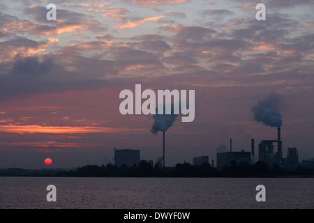 Wismar, Germany, fuming chimneys of industrial plant Klausner Nordic Timber Stock Photo