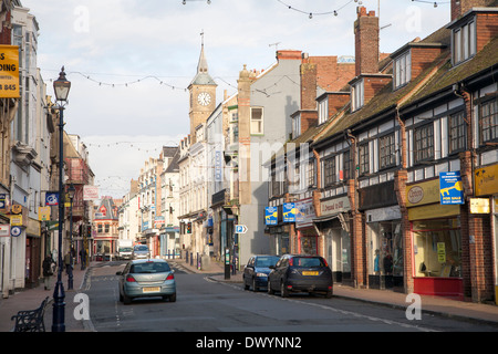 View of the main shopping street, High Street, Ilfracombe in winter evening light, north Devon, England Stock Photo