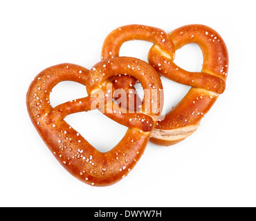 Pair delicious Bavarian pretzel in heart shape, isolated Stock Photo