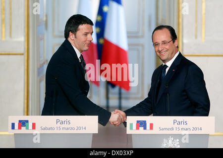 Paris, France. 15th Mar, 2014. French President Francois Hollande (R) and Italian Prime Minister Matteo Renzi give a press conference after their meeting at the Elysee Palace in Paris, France, March 15, 2014. Credit:  Etienne Laurent/Xinhua/Alamy Live News Stock Photo