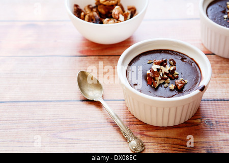 chocolate mousse with walnut pieces, food closeup Stock Photo