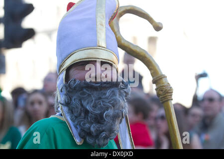 London UK. 16th March 2014. A man dressed as Saint Patrick the Patron Saint of Ireland. Saint Patrick  celebrated in Northern Ireland, Ireland and Irish communities around the world Stock Photo