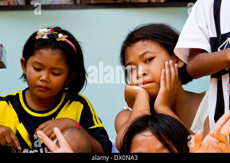 Sea Gypsy Kids in Chao Ley on Koh Siray, Phuket, Thailand Stock Photo