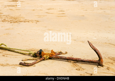 Old anchor buried in the sand at the patch, Gwbert on Sea Stock Photo ...