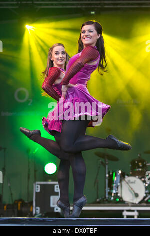 London, UK. 16th March, 2014. World-famous Riverdance, originally produced by Michael Flatley, ends the St Patrick's Day celebrations in Trafalgar Square, London. The dancers performed ahead of their 20th anniversary tour on the state in Trafalgar Square. Credit:  Nick Savage/Alamy Live News Stock Photo