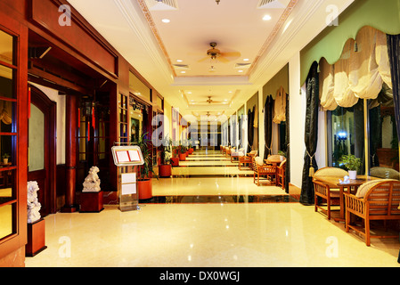 The entrance in restaurant and interior of luxury hotel with working ventilators, Ajman, UAE Stock Photo