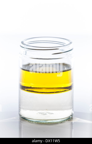 Oil & Water in a glass jar Stock Photo