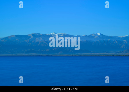 Lake Issyk Kol at dawn, Tien Shan Mountains, Kyrgyzstan Stock Photo