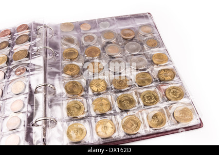 Coin album with world coins Stock Photo
