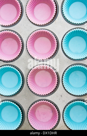 Tray of blue and pink silicon cup cake moulds Stock Photo