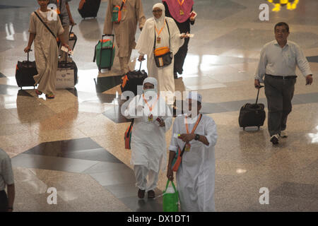 Passengers approach passport control at Kuala Lumpur International Airport (KLIA) in Sepang, Malaysia, on Friday, March 14, 2014. Stock Photo