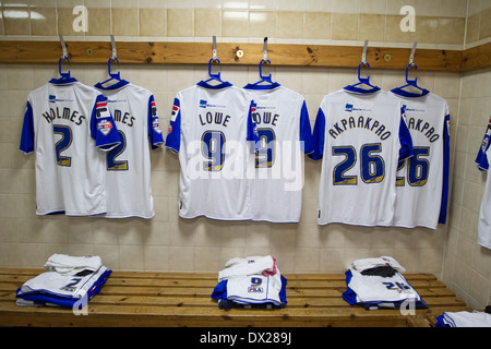 Home team strips laid out in the dressing room at Prenton Park home of Tranmere Rovers Football Club. Stock Photo